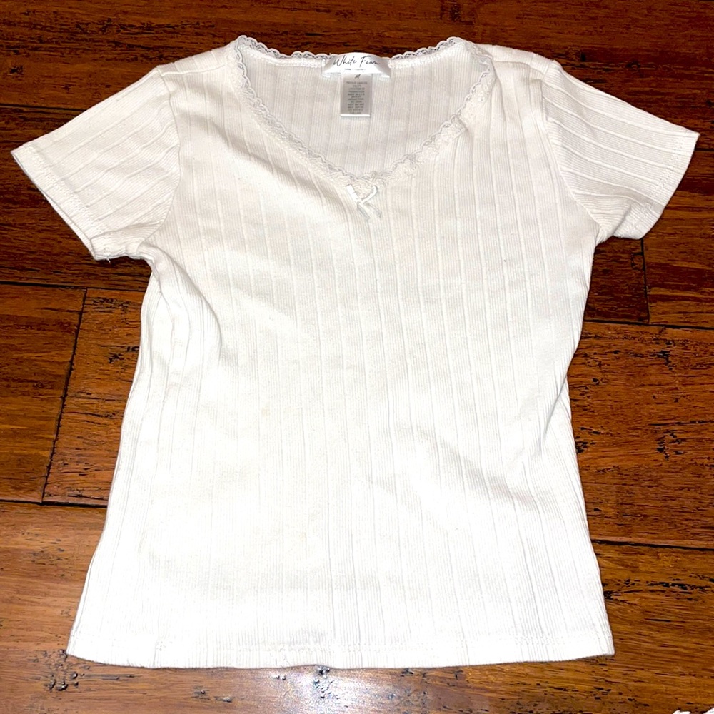 Brand- tilly’s, Color white, size medium in girls.